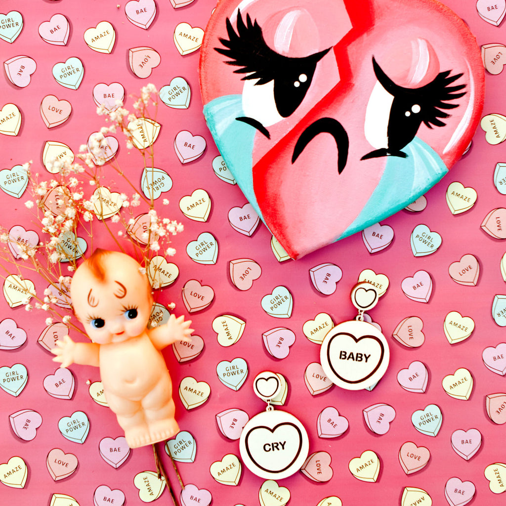 Candy & Kitsch candy heart earrings sits in a kitsch interior design in the variation ’cry baby' inspired by CryBaby