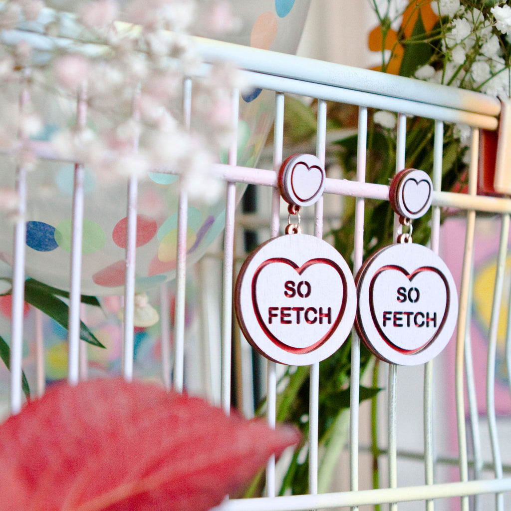 Candy & Kitsch candy heart earrings sits in a kitsch interior design in the variation ’so fetch' inspired by mean girls