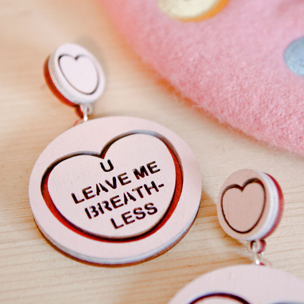 Candy & Kitsch candy heart earrings sits in a kitsch interior design in the variation ’u leave me breathless' inspired by Futurama