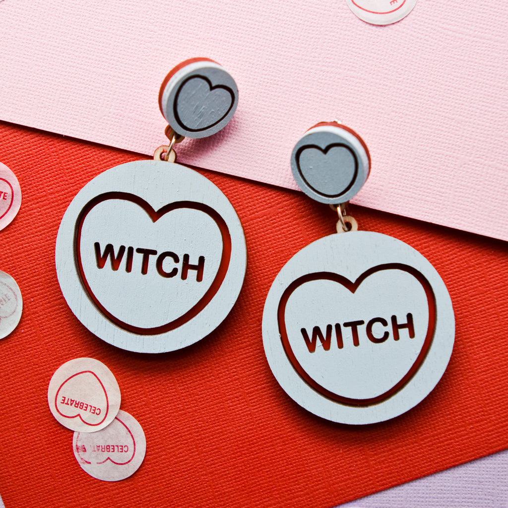 Candy & Kitsch candy heart earrings sits in a kitsch interior design in the variation ’witch'