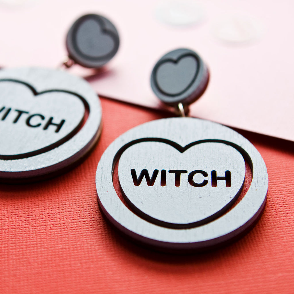 Candy & Kitsch candy heart earrings sits in a kitsch interior design in the variation ’witch'