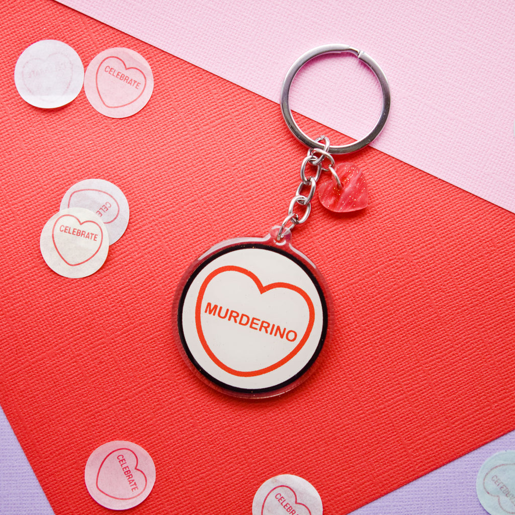 Candy & Kitsch candy heart keyring keychain sits in a kitsch interior design in the variation ’murderino' inspired by My Favorite Murder podcast