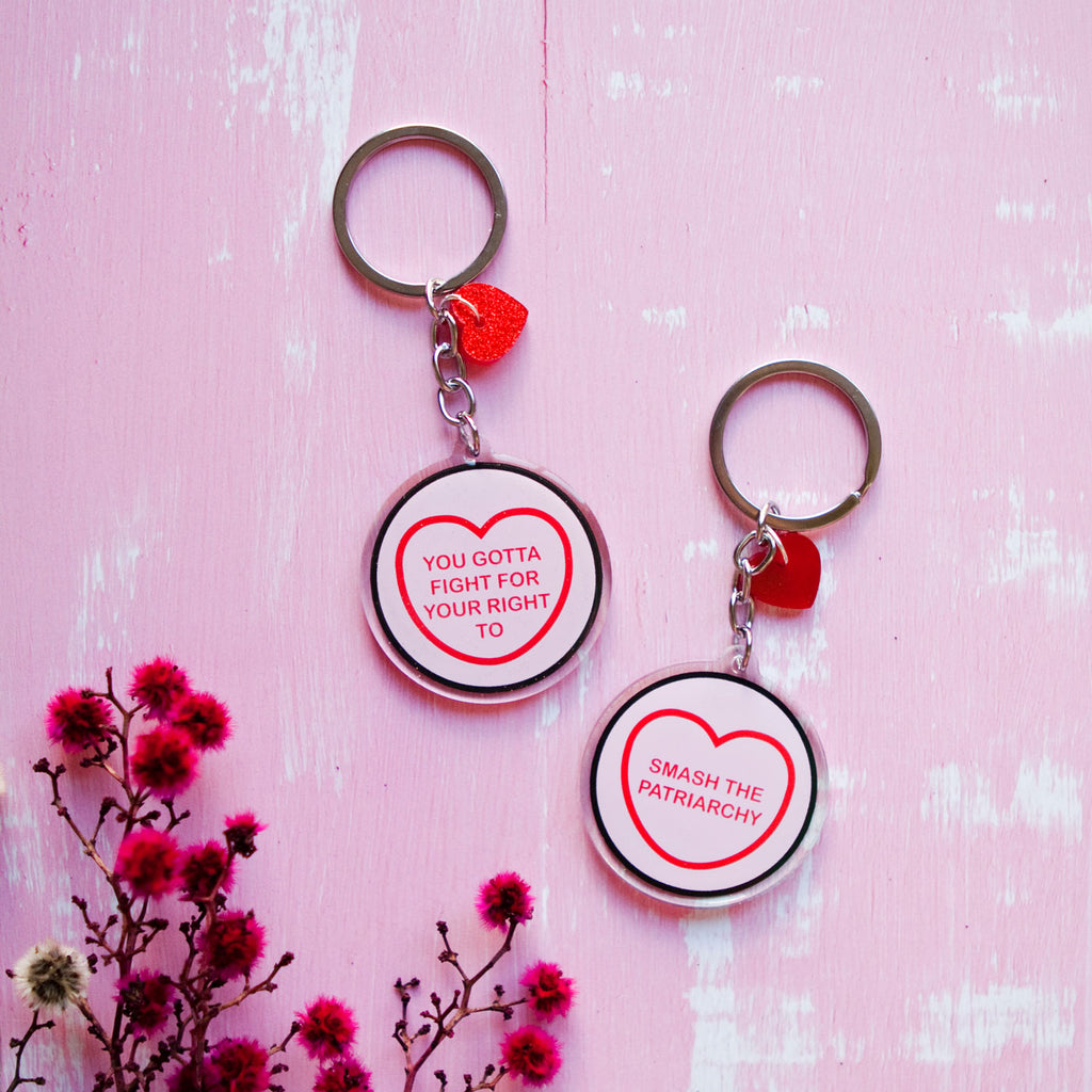Candy & Kitsch candy heart keyring keychain sits in a kitsch interior design in the variation ’you gotta fight for your right to smash the patriarchy' inspired by The beastie Boys