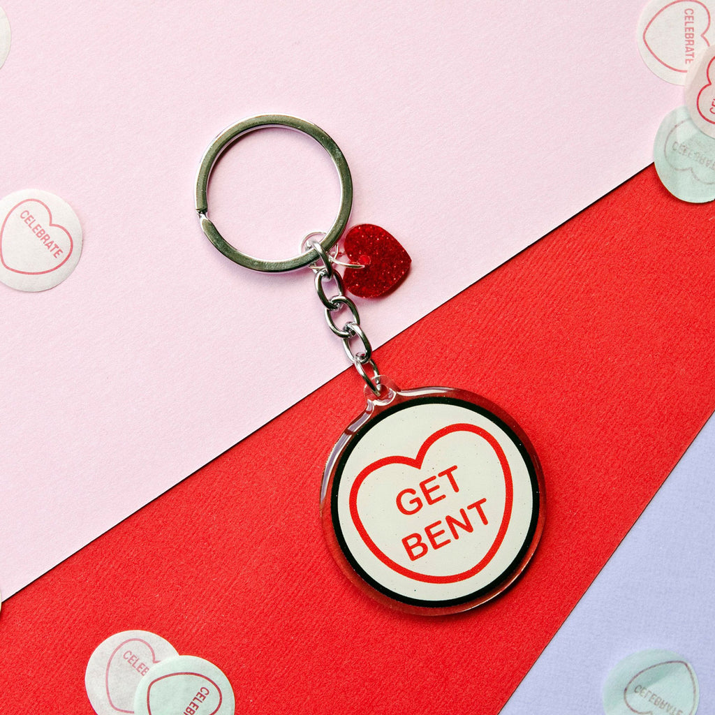Candy & Kitsch candy heart keyring keychain sits in a kitsch interior design in the variation ’Get Bent' inspired by The Simpson.