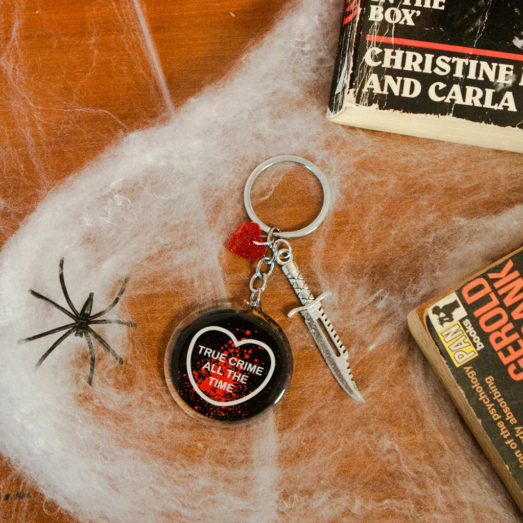 Candy & Kitsch candy heart keyring keychain sits in a kitsch interior design in the variation ’true crime all the time'
