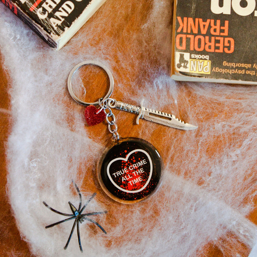 Candy & Kitsch candy heart keyring keychain sits in a kitsch interior design in the variation ’true crime all the time'