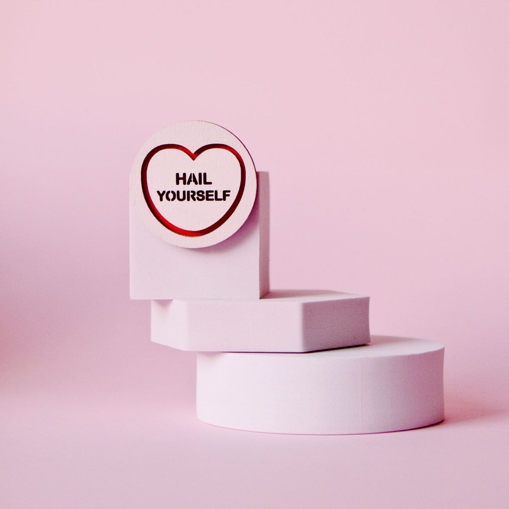 Candy & Kitsch candy heart brooch sits in a kitsch interior design in the variation ’Hail Yourself' inspired by Last Podcast on the Left