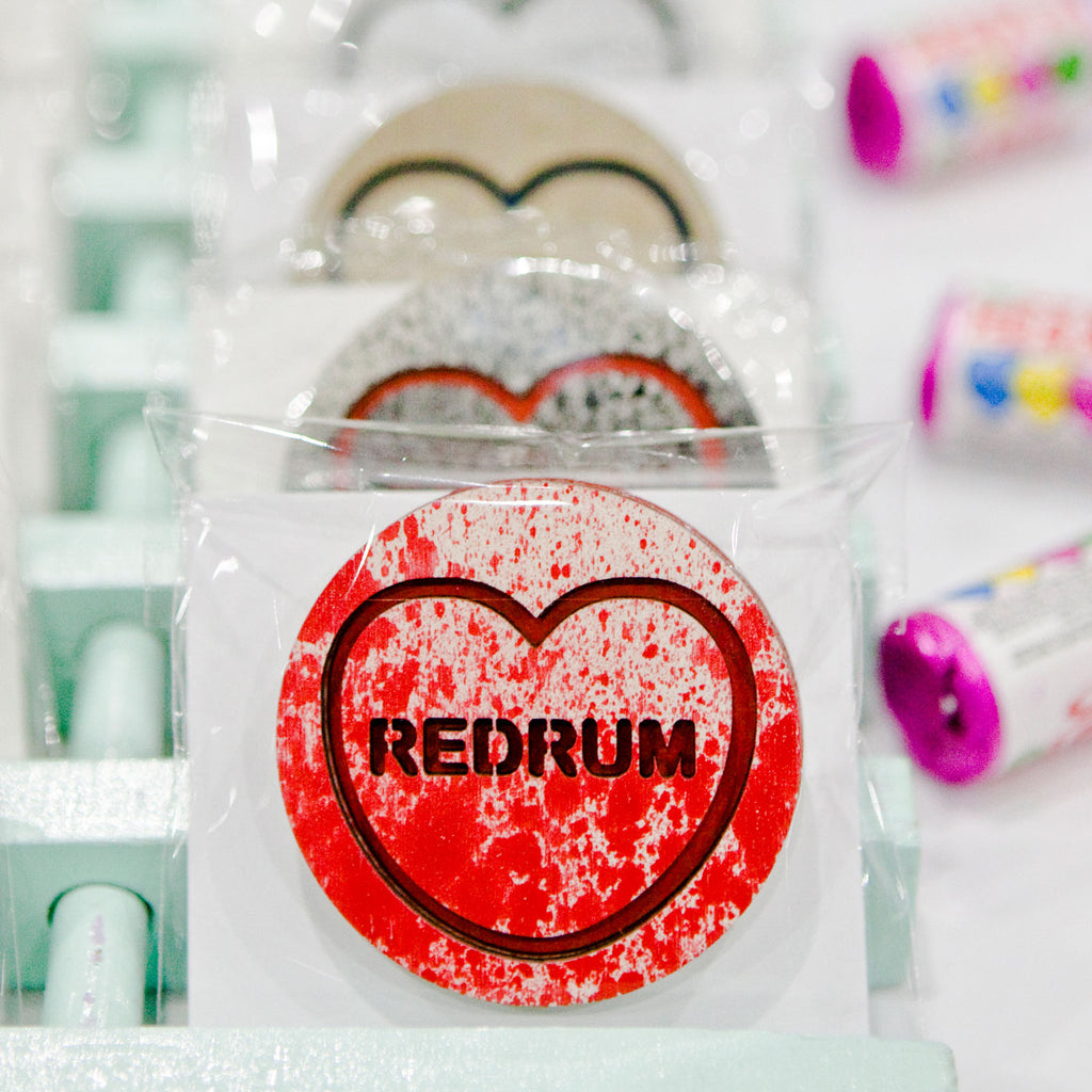 Candy & Kitsch candy heart brooch sits in a kitsch interior design in the variation ’redrum' inspired by the shining