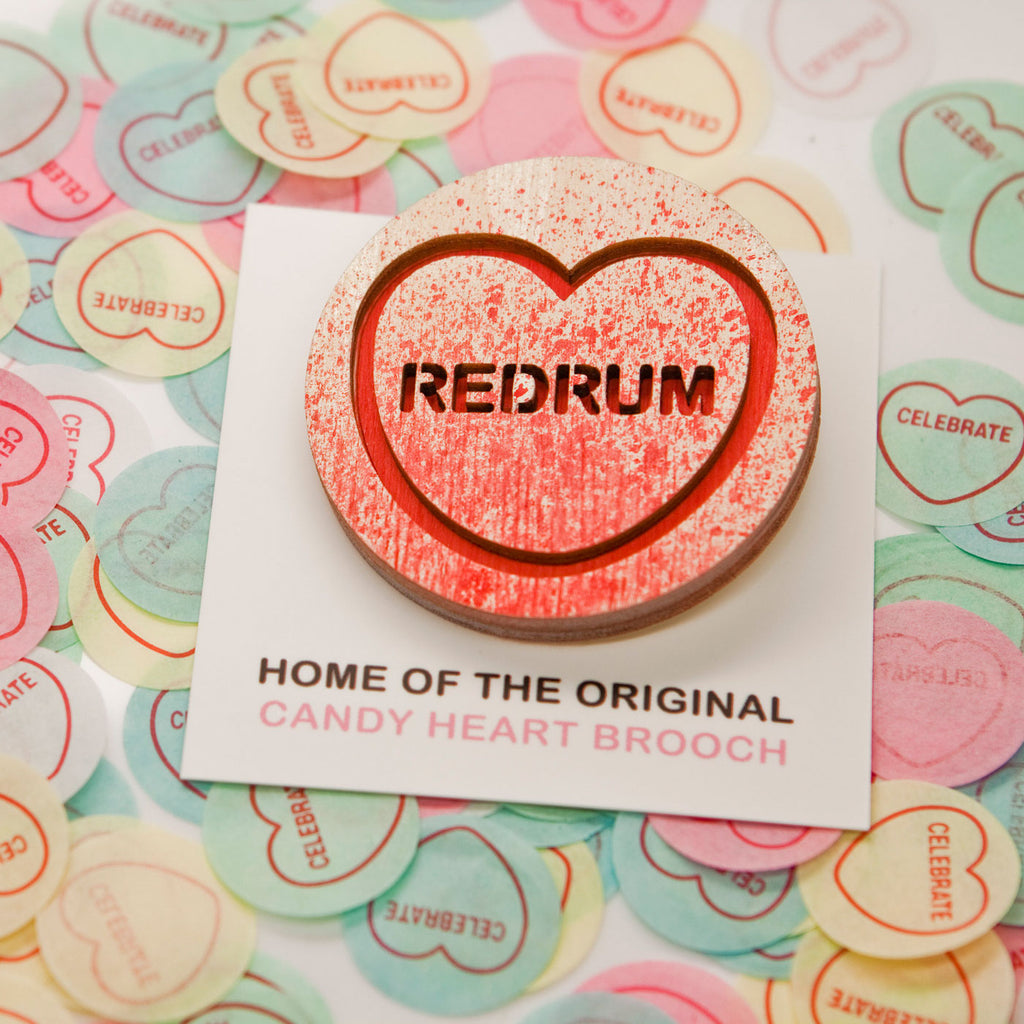 Candy & Kitsch candy heart brooch sits in a kitsch interior design in the variation ’redrum' inspired by the shining