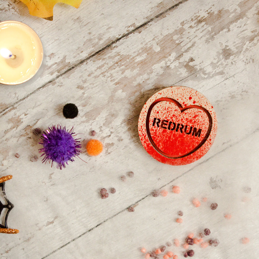 Candy & Kitsch candy heart brooch sits in a kitsch interior design in the variation ’redrum' inspired by the shining