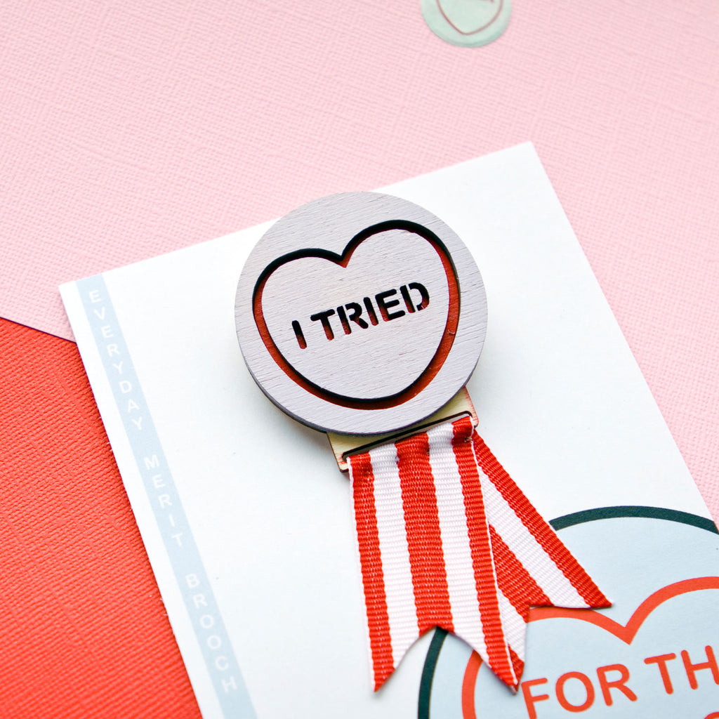 Candy & Kitsch candy heart merit badge brooch handmade in Australia sits in a kitsch interior design in the variation ’i tried'