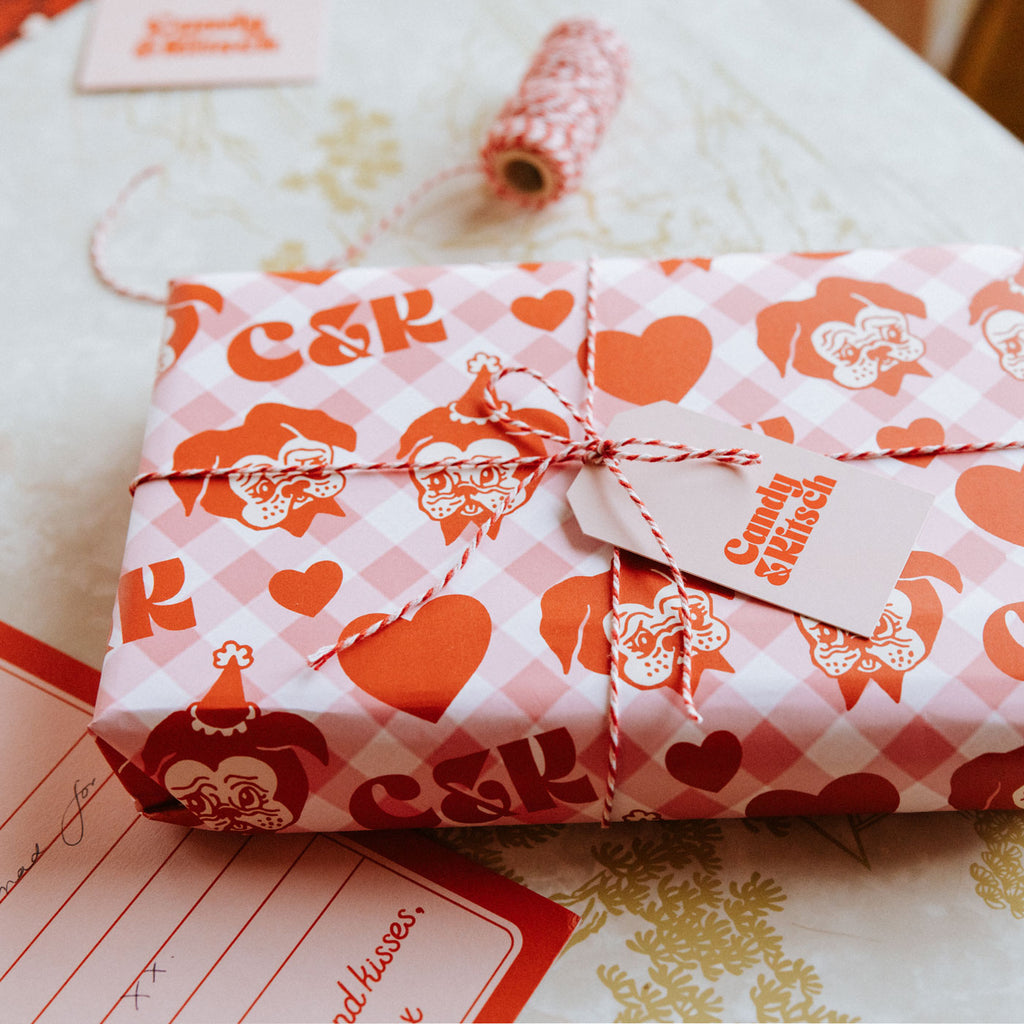 Candy & Ktsch's gift wrapping service with custom giftwrap, twine, card and handwritten note